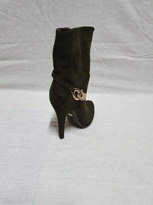 black heels with gold accents