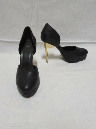 black high heels with golden heel