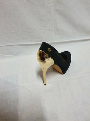 black high heels with gold heel