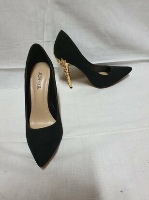 black high heels with gold heel