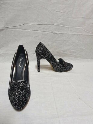 black high heels with silver accents