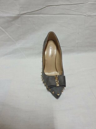 black stiletto heels with studs