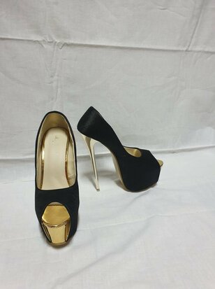 black high heels with gold heel