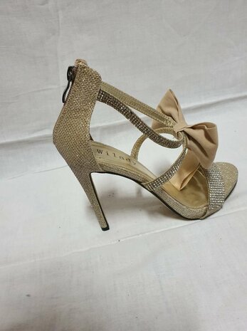 chaussures dorées avec nœud