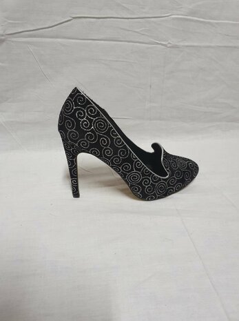 black high heels with silver accents